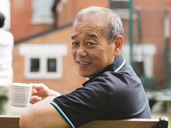 Older man having a cup of tea
