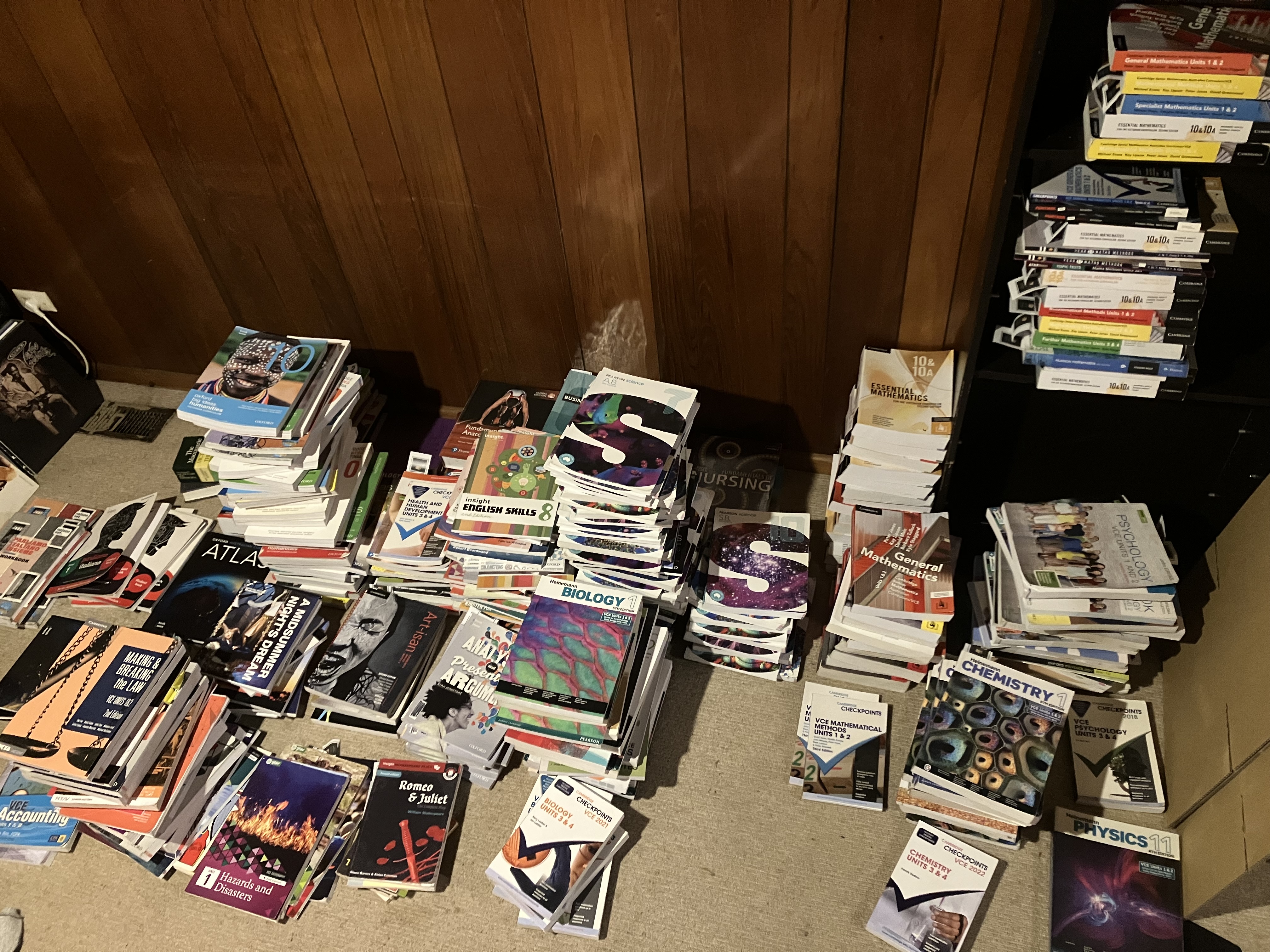 A pile of just some of the over 300 textbooks collected by Young Assets Foundation and Yarra Libraries as part of a textbook drive for the Fitzroy Youth Homework Club at Fitzroy Library
