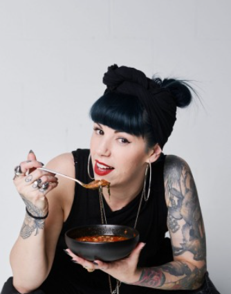 Photo of chef Shannon Martinez eating